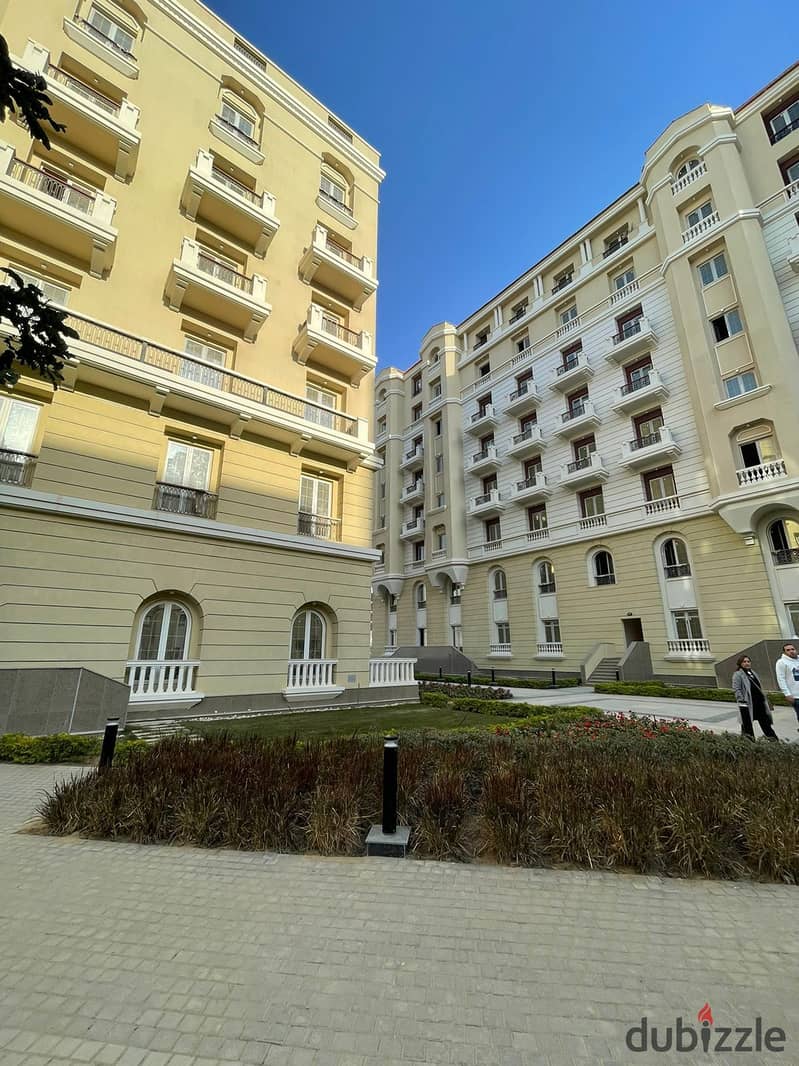 For sale, an apartment in New Garden City Compound from City Edge Company and the Housing and Development Bank, in installments over 12 years. 8