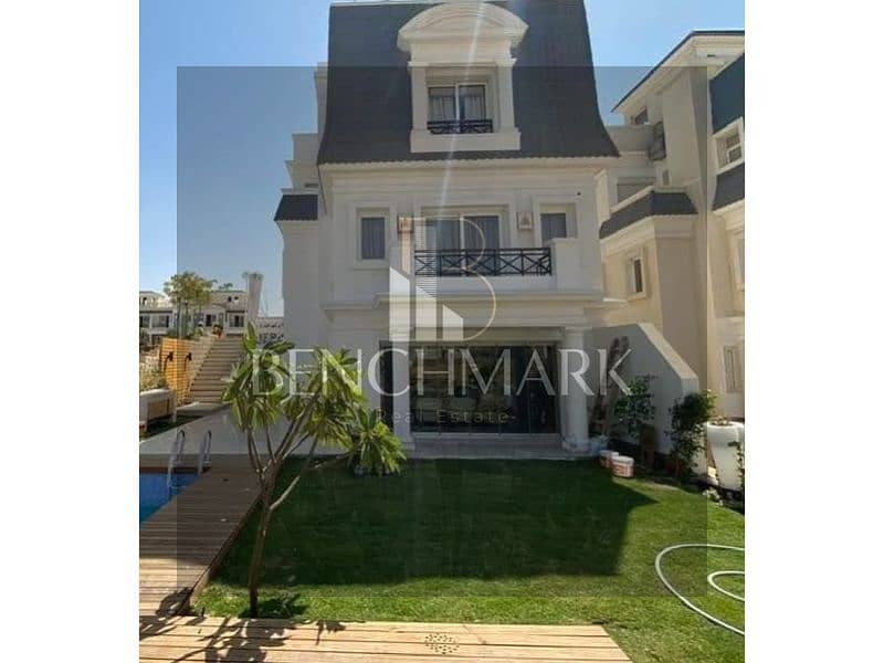 Villa with garden for sale, with a distinctive division and an open sea view, in Mountain View Compound in October, near Mall of Arabia 3