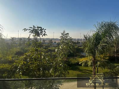 "Apartment of 149 m² plus 50 m² on the ground floor with a garden for sale in Madinaty, overlooking the waterway in B14. "