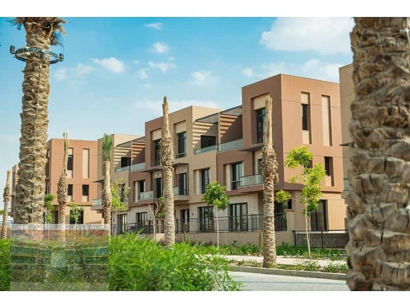 Delivered Apartment Terrace overlooking the landscape and club in District 5 Marakez New Cairo 11