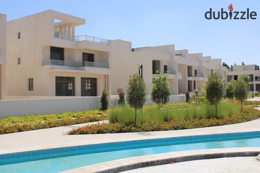 Standalone villa with a pool, super spacious at 434 m², right on the waslet Dahshur in Sheikh Zayed. 1