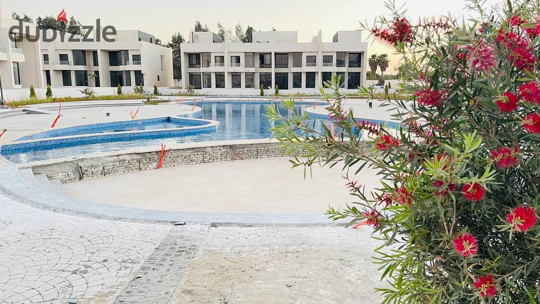 Standalone villa with a pool, super spacious at 434 m², right on the waslet Dahshur in Sheikh Zayed. 9