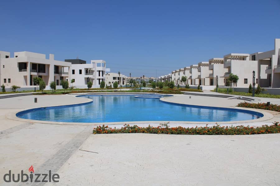 Standalone villa with a pool, super spacious at 434 m², right on the waslet Dahshur in Sheikh Zayed. 13