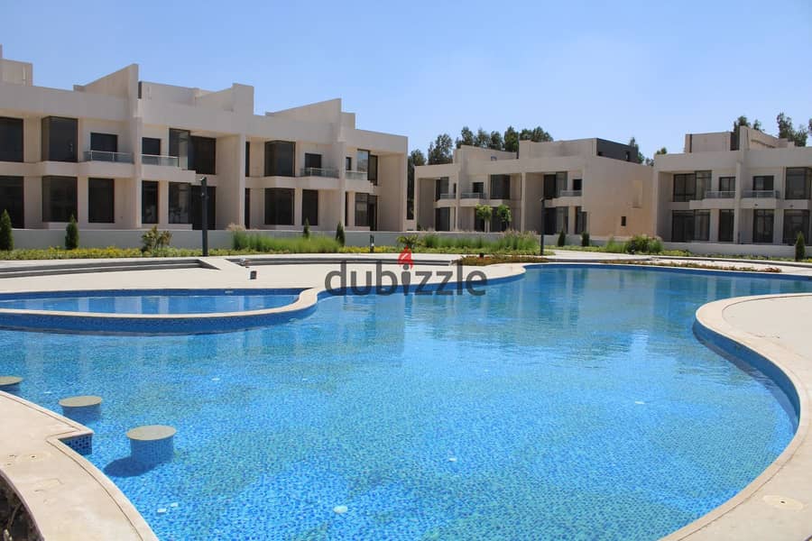 Standalone villa with a pool, super spacious at 434 m², right on the waslet Dahshur in Sheikh Zayed. 16