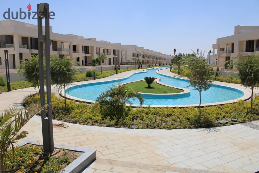 Standalone villa with a pool, super spacious at 434 m², right on the waslet Dahshur in Sheikh Zayed. 18