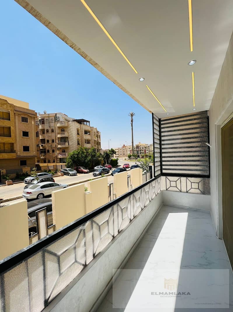 Apartment for sale, super luxury , located on a raised ground floor in District 16 , in front of Beverly Hills and close to Mazar Mall 1