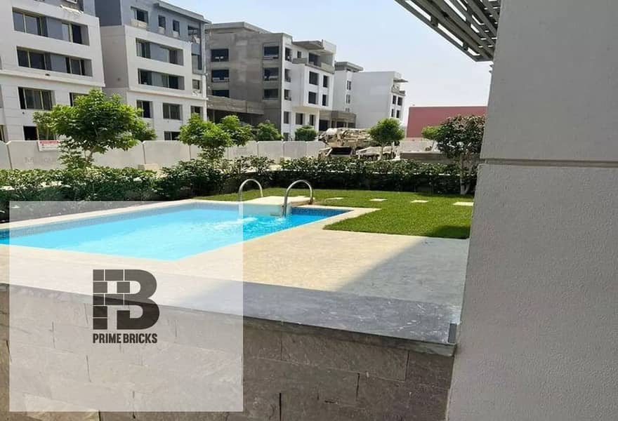 With a 5% down payment and installments over 10 years, 172 m apartment for sale in Trio Gardens Compound 4