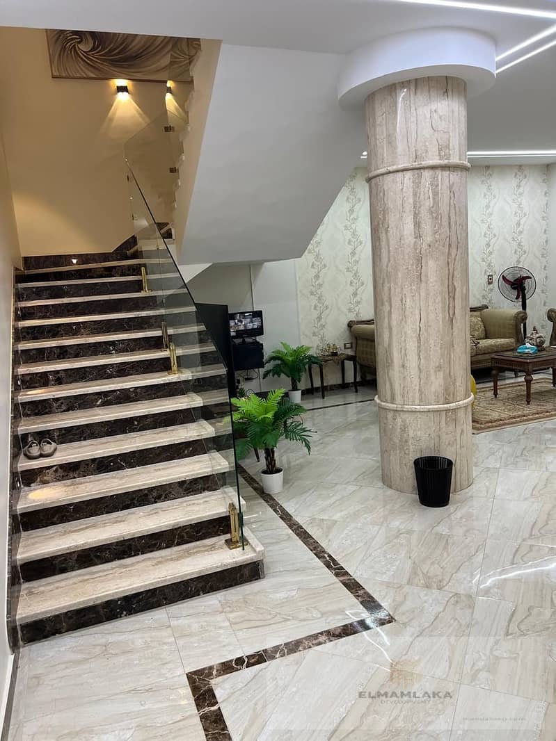 Villa in Al-Khamail Compound, Sheikh Zayed, in front of Hyper One. The villa is situated on a high hill, overlooking Sheikh Zayed and Arkan Plaza Mall 12