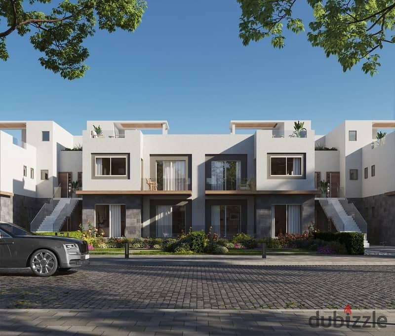 Own a villa with a landscape view in levels by dunes in installments over 8 years in Sheikh Zayed in front of SODIC STRIP 2