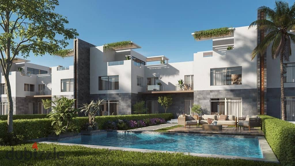 Own a villa with a landscape view in levels by dunes in installments over 8 years in Sheikh Zayed in front of SODIC STRIP 4