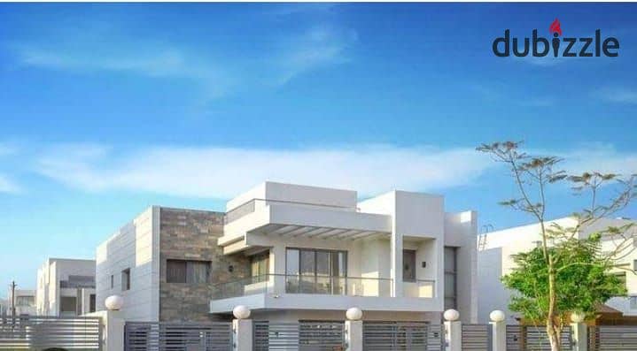 Twin villa for immediate delivery with a garden area of ​​234 square meters, directly on the axis in Sheikh Zayed, in installments 2