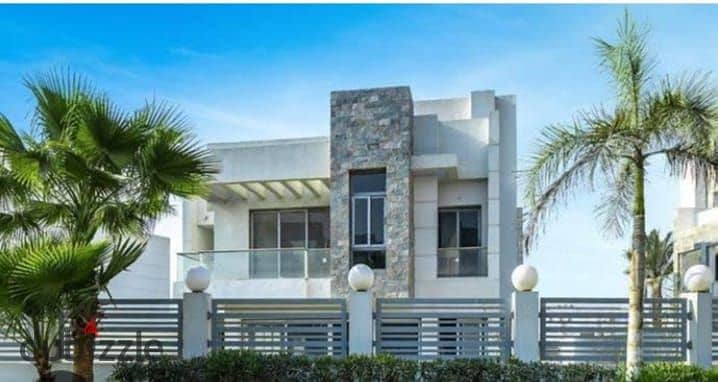 Twin villa for immediate delivery with a garden area of ​​234 square meters, directly on the axis in Sheikh Zayed, in installments 4