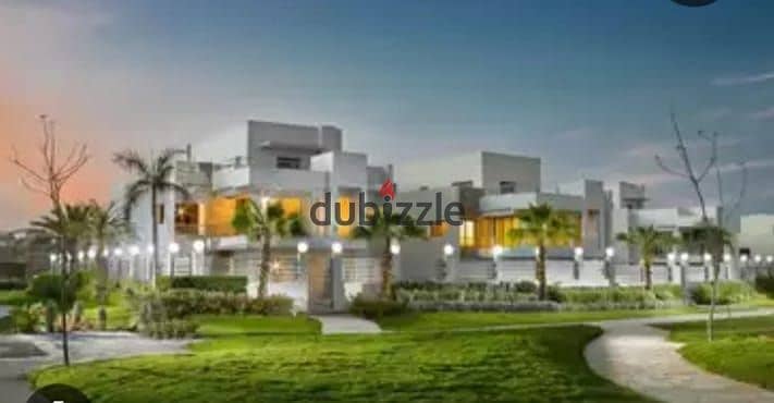 Twin villa for immediate delivery with a garden area of ​​234 square meters, directly on the axis in Sheikh Zayed, in installments 6