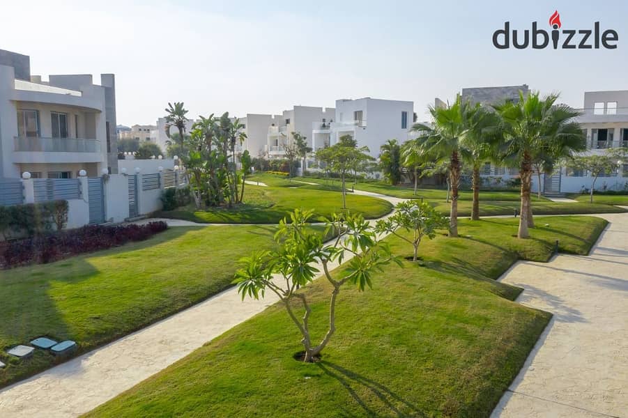 Twin villa for immediate delivery with a garden area of ​​234 square meters, directly on the axis in Sheikh Zayed, in installments 7