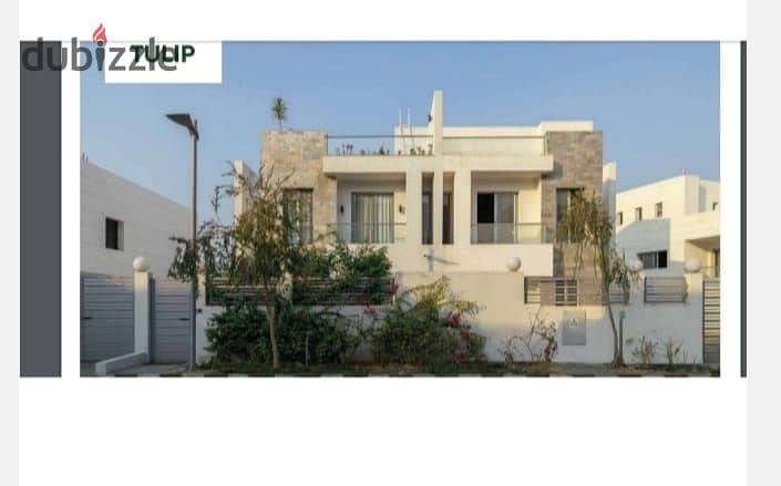 Twin villa for immediate delivery with a garden area of ​​234 square meters, directly on the axis in Sheikh Zayed, in installments 8