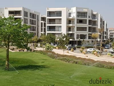 Apartment for sale with a private garden in front of Kempinski Hotel in Taj City Compound