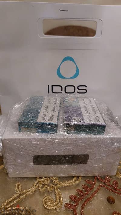 iqos iluma one جديد ومعاه علبتين تيرا