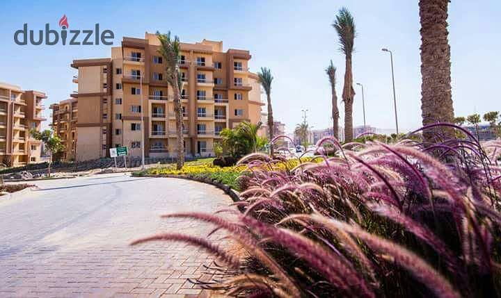 Apartment for sale in installments in October without commissions with a distinctive view of the landscape and trees in Ashgar City Compound 9