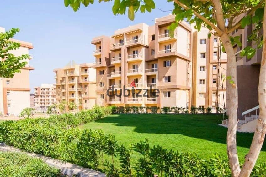 Apartment for sale in installments in October without commissions with a distinctive view of the landscape and trees in Ashgar City Compound 12