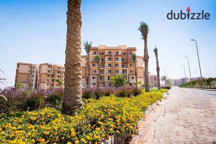 Apartment for sale in installments in October without commissions with a distinctive view of the landscape and trees in Ashgar City Compound 13