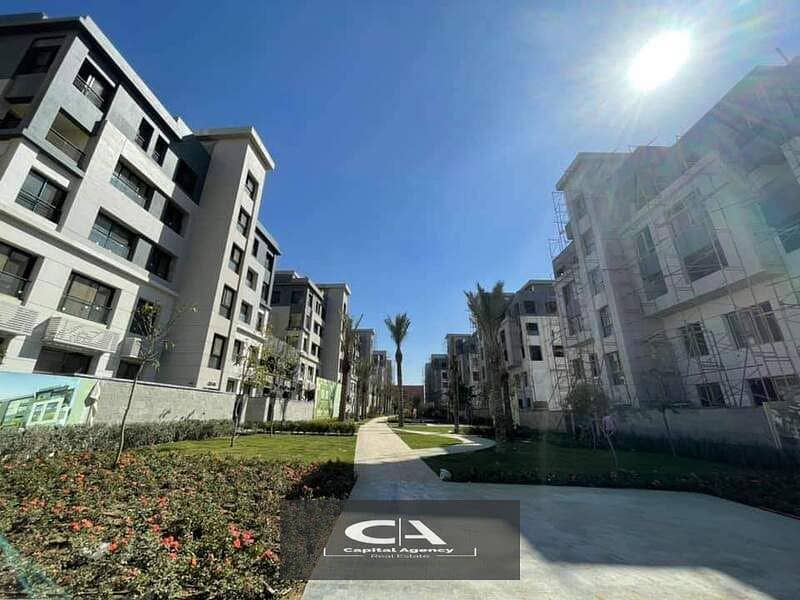 Apartment for sale in a garden in the heart of Golden Square, with a 5% down payment and equal installments in Trio Gardens with M Square | 35% cash d 10