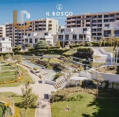 شقة بحديقة للبيع استلام فوري موقع مميز كمبوند البوسكو العاصمة الادارية لشركة مصر ايطاليا  Il Bosco City New capital by Misr Italia Properties 0