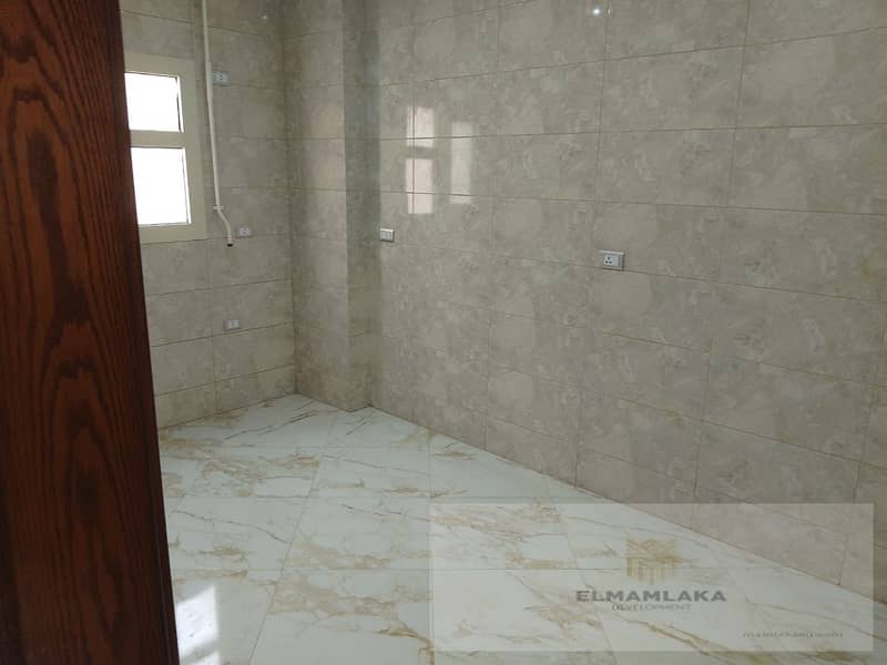 "First-floor apartment for rent in the 7th District of Sheikh Zayed. 9