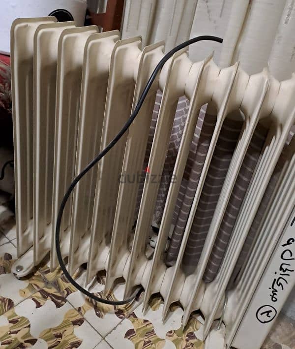 دفاية زيت 12 ريشة oil heater 2500w 1