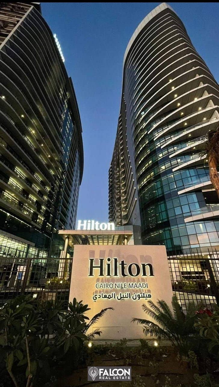 For sale, a hotel apartment overlooking the Nile, immediate delivery and hotel finishing in Hilton Towers (Service by Hilton) 1