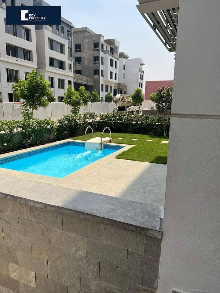 Duplex with  garden + pool in 10-years installments, in Trio Gardens Compound, in Fifth Settlement . 2