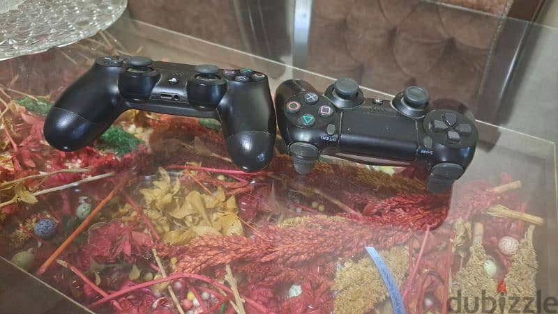 ps4 slim 1 tera مع دراعين original من قطر 4