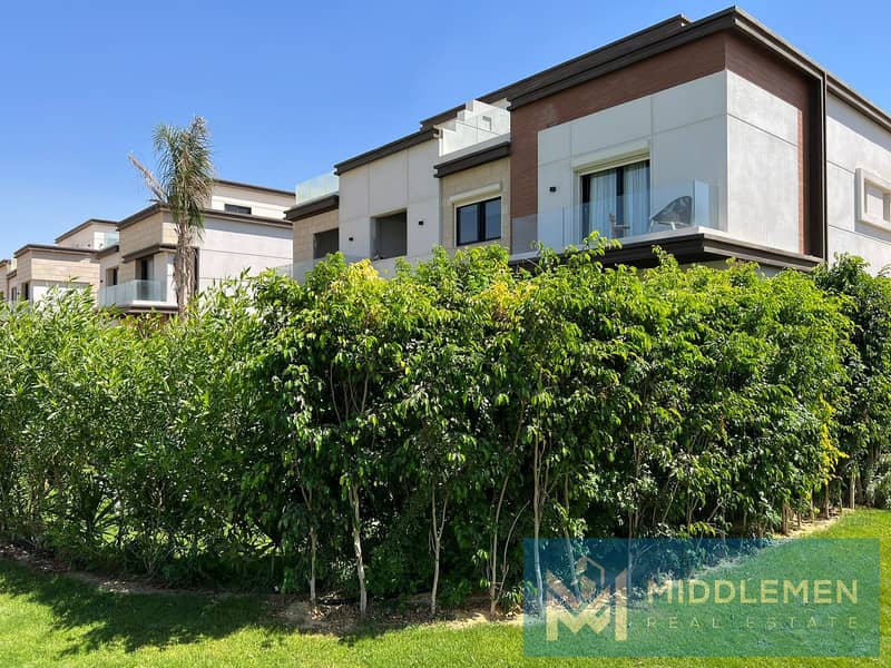 town house corner 225m with garden 180m delivered prime location , azzar 2 new cairo 7