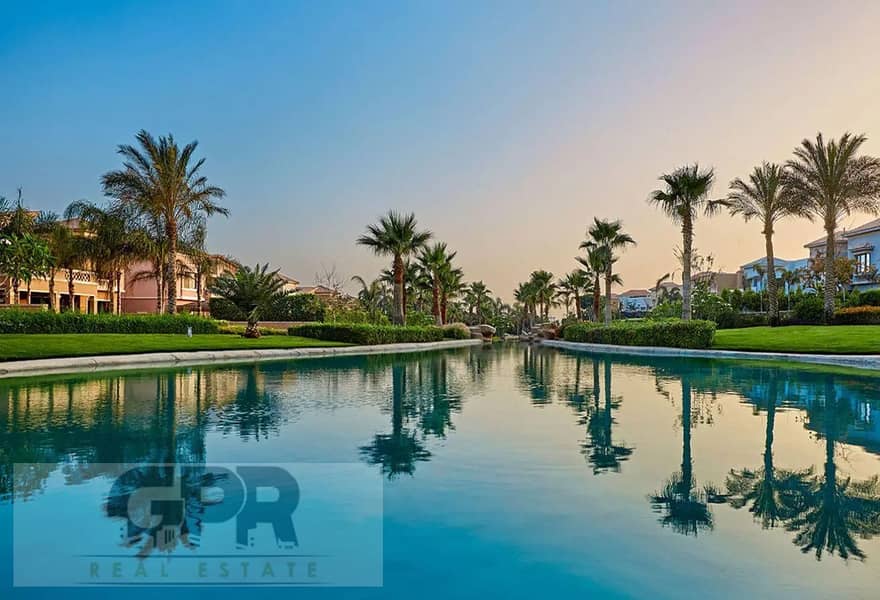 Duplex with garden direct view on lake for sale in Creek Town Compound,  New Cairo 1