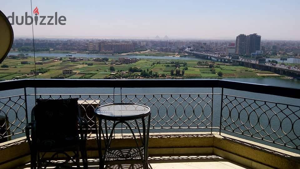 Apartment for sale in Reve du Nil Towers, Maadi, delivery in months, in installments 1