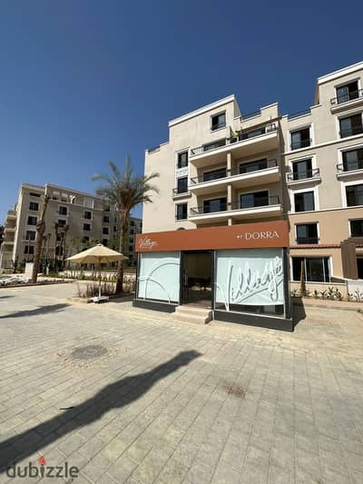 Apartment for sale in Village West Compound, Sheikh Zayed, super deluxe finishing, with air conditioners, distinctive view in front of the club