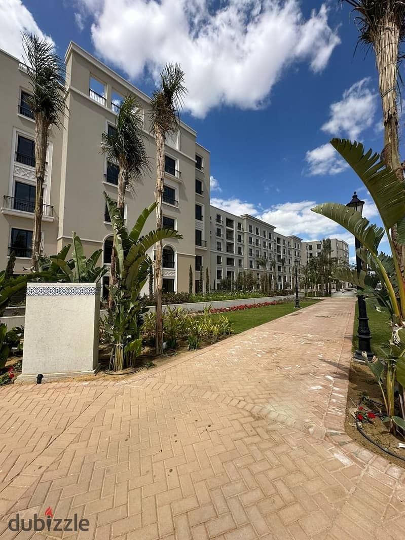 Apartment for sale in Village West Compound, Sheikh Zayed, super deluxe finishing, with air conditioners, distinctive view in front of the club 15