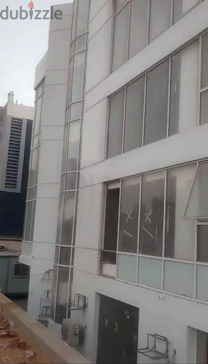 محل للبيع 55م ومعاه 70م اوت دور AYA MALL التجمع الاول 1