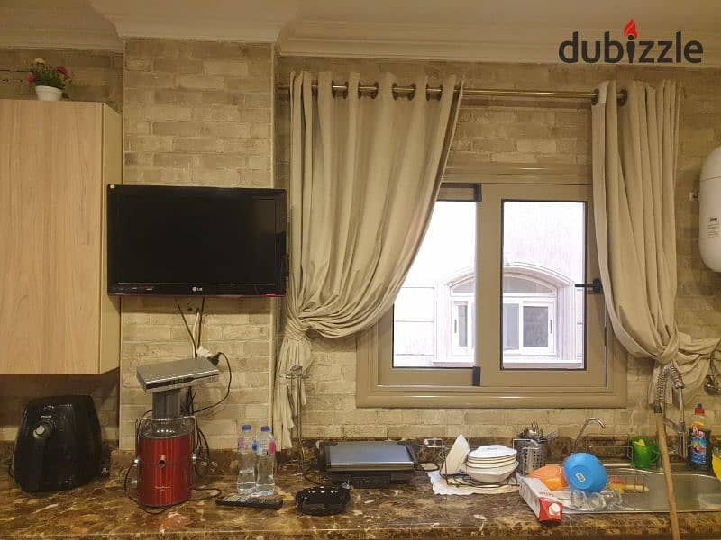 Receive your apartment immediately, 245 m, finished with kitchen and air conditioning, overlooking a main street in Al Narges Buildings 10