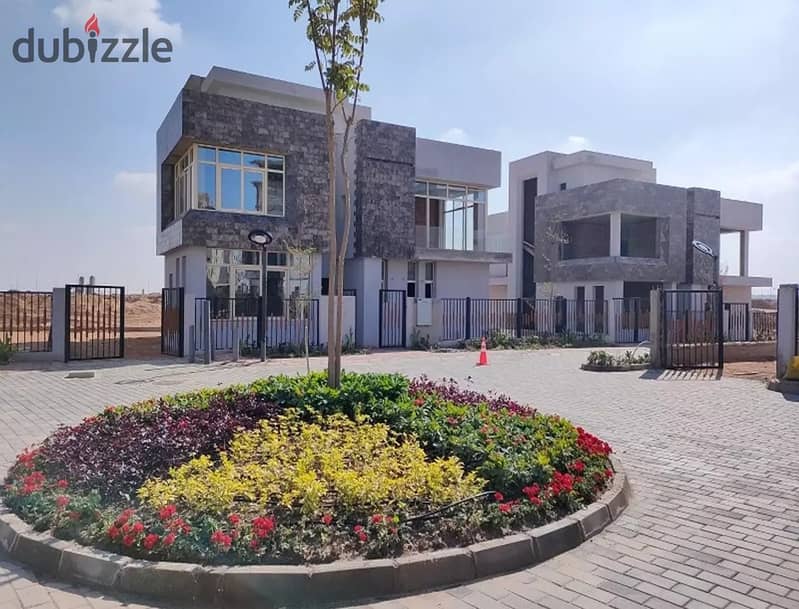 Twin house for immediate delivery with installment options in a prime location in 6th of October, facing Mall of Egypt and near Media Production City. 2