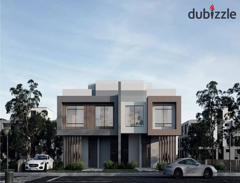 Twin house for immediate delivery with installment options in a prime location in 6th of October, facing Mall of Egypt and near Media Production City. 6