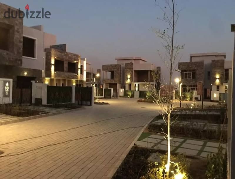 Twin house for immediate delivery with installment options in a prime location in 6th of October, facing Mall of Egypt and near Media Production City. 12