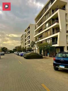 Two-bedroom apartment with a double view for sale in Taj City Compound in New Cairo on the Suez Road in front of Cairo Airport and near 5th Settlement 0