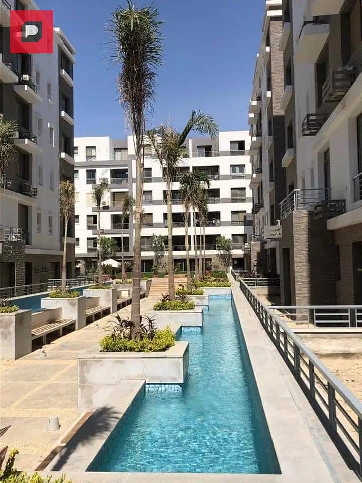 Two-bedroom apartment with a double view for sale in Taj City Compound in New Cairo on the Suez Road in front of Cairo Airport and near 5th Settlement 7