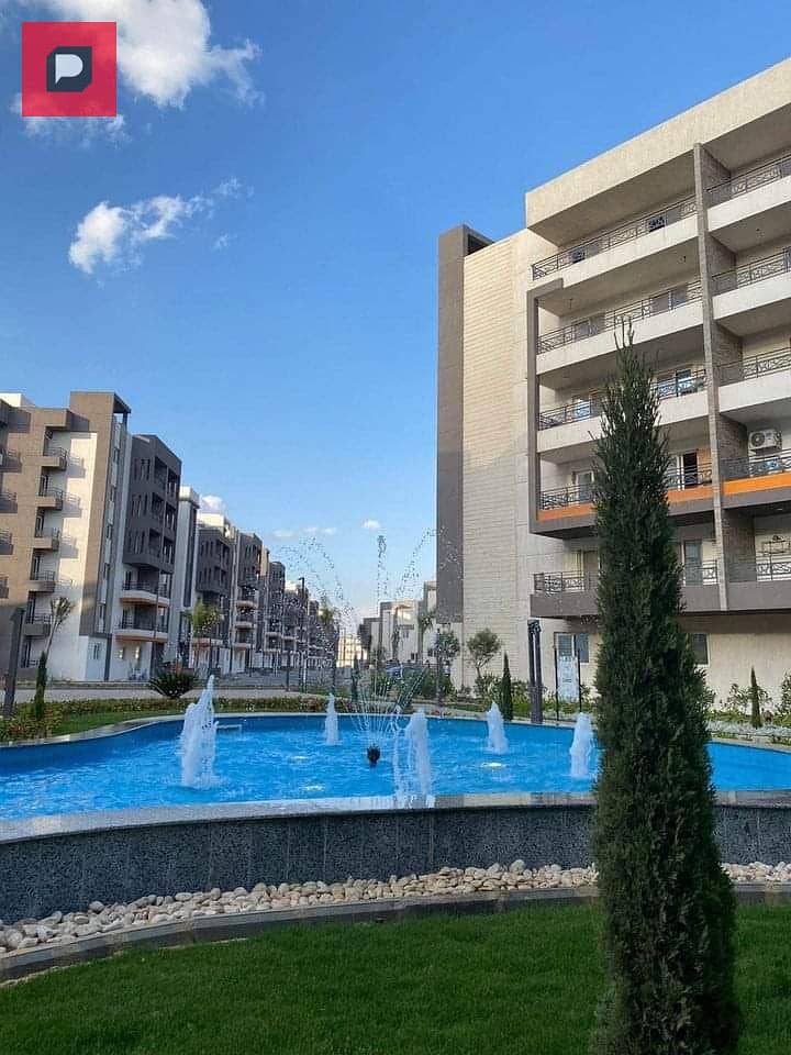 Two-bedroom apartment with a double view for sale in Taj City Compound in New Cairo on the Suez Road in front of Cairo Airport and near 5th Settlement 8