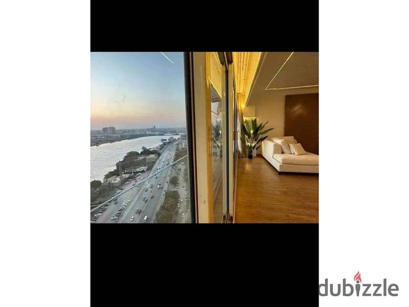 With the highest investment return, a hotel studio for sale with furnishings, air conditioners, and appliances on Maadi Corniche, Du Nile Rustic Tower 1