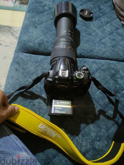 Nikon D5000 with Lens sigma 70-300Auto