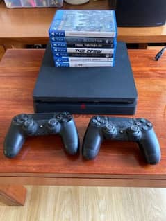 Playstation 4 slim with 2 controllers 0