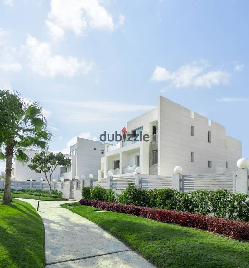 Live in a 3-storey villa in installments, prime location, in Sheikh Zayed, in CELOPATRA SQUARE 0