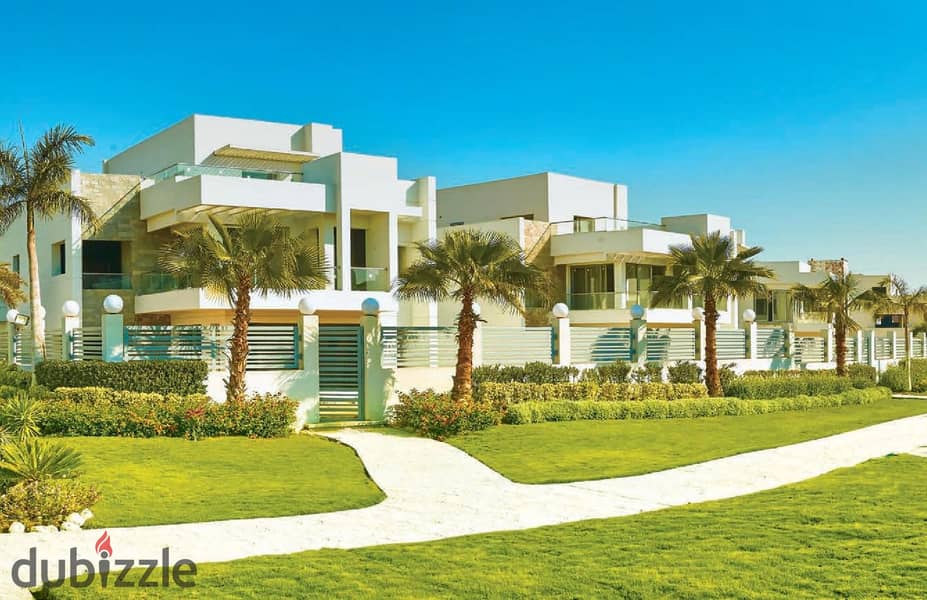 Live in a 3-storey villa in installments, prime location, in Sheikh Zayed, in CELOPATRA SQUARE 2