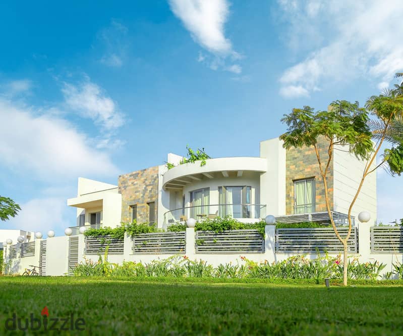 Own a villa with a landscape view in installments, prime location in Sheikh Zayed in CELOPATRA SQUARE 13